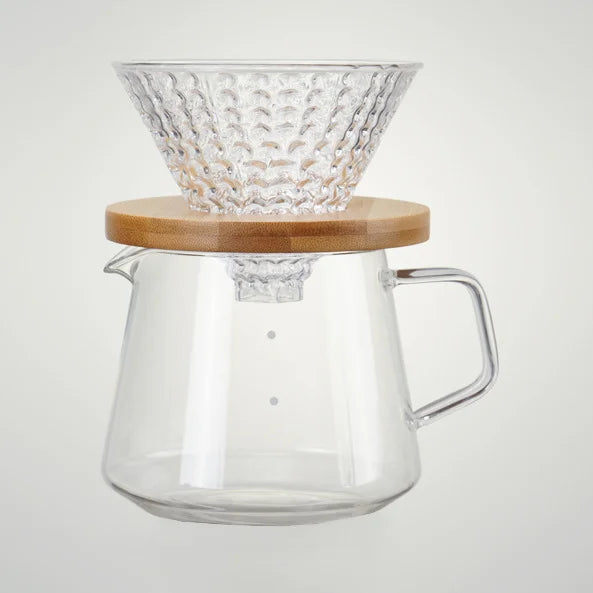 Clear glass coffee maker with wooden lid and handle on a white background
